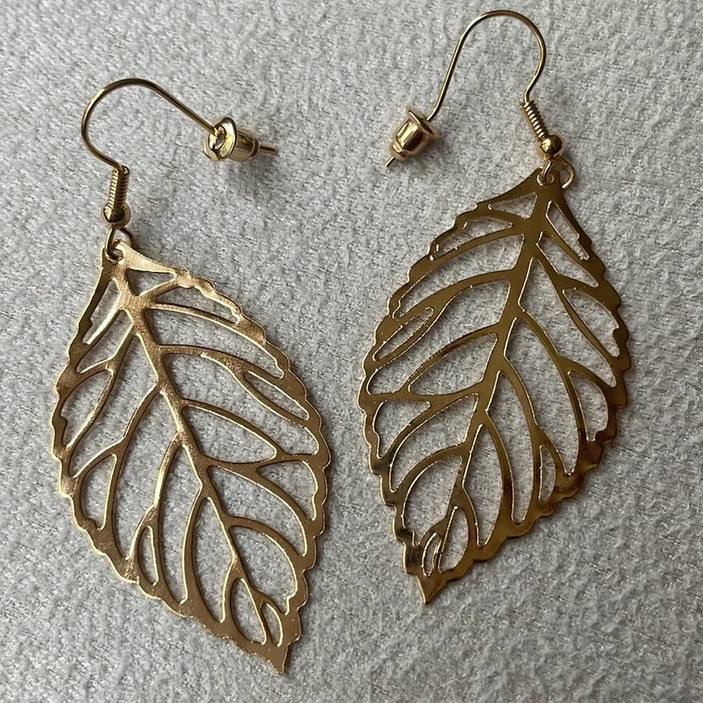 Gold hollow leaf earrings